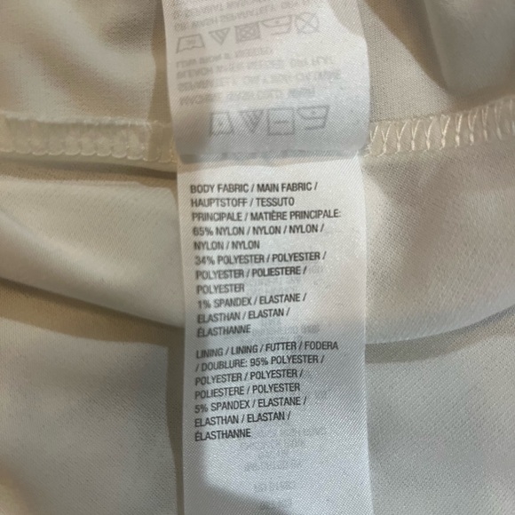 Susan Graver stretch floral lace, lined, peplum tunic. Size XS - Picture 9 of 9